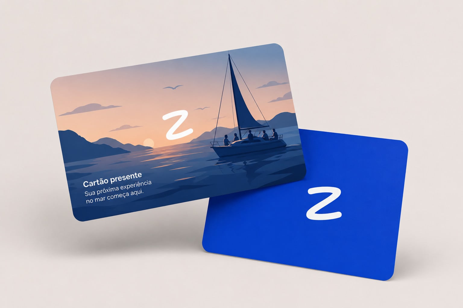 Cartão presente da Zarpi, com ilustração de veleiro ao pôr do sol de um lado e o Z da marca do outro